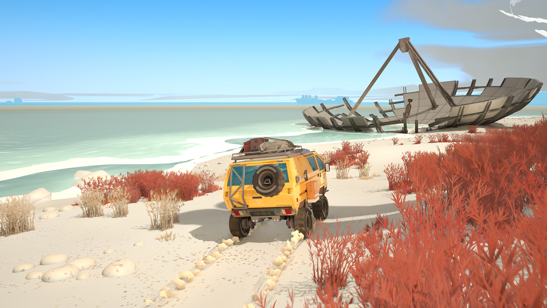 A screenshot from Caravan SandWitch. We see the back of a yellow van as it drives down a sandy beach towards what appears to be a fallen satellite.