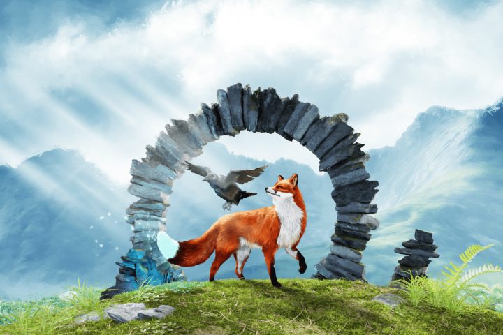 The key art for Spirit of the North 2, with no logo. A fox stands beneath a stone arch. A large black bird is also hovering between the arch and the fox. The grass below them is green, and there are mountains in the background.